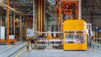 Detailed view of machinery in an operational glass factory in Dar es Salaam. — Bike Insurance Facts You Need To Know