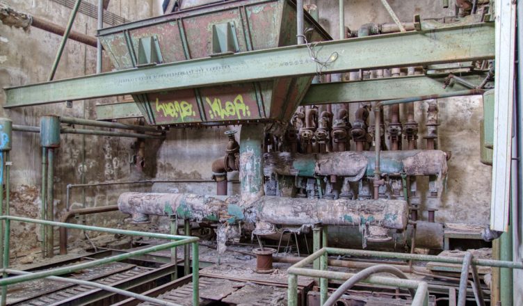 Old industrial machinery in a deteriorating factory in Leipzig, Germany. — Choose the Right Flammable Storage Cabinet to Stor