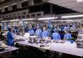 Indian textile factory workers expertly packaging products on an assembly line. — Everything You Need to Know About Precision
