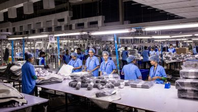 Indian textile factory workers expertly packaging products on an assembly line. — Everything You Need to Know About Precision