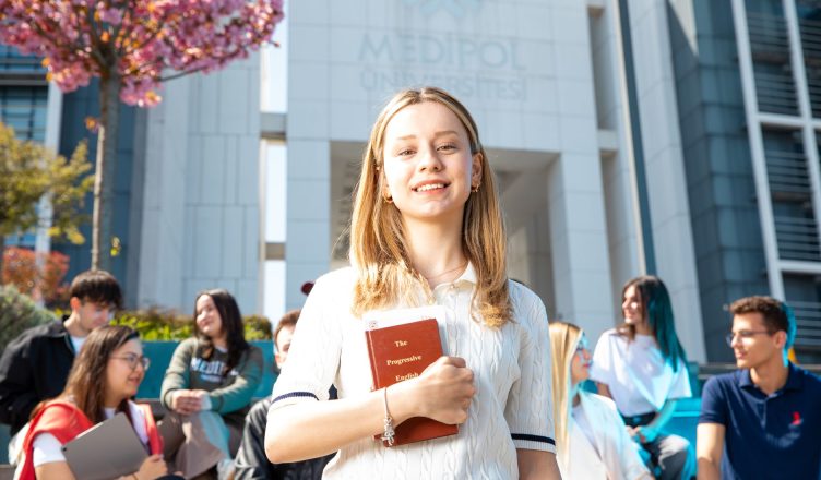 Happy university students socializing on campus, with a focus on a smiling young woman holding a book. — How can you achieve
