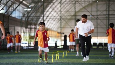 Energetic indoor soccer training with kids and coach, focusing on agility and teamwork. — How to Get a Wholesale License in C