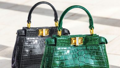 Elevate your style with these exquisite green and black crocodile pattern handbags, perfect for a luxury fashion statement. —