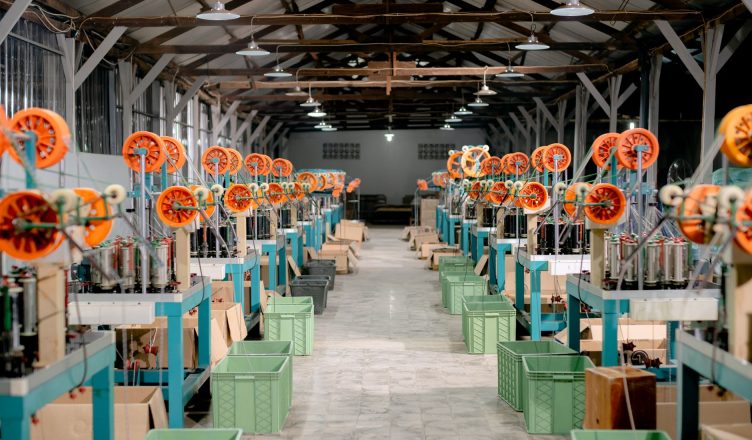 Spacious industrial hall with machinery and equipment for manufacturing. Ideal stock image for industry themes. — The Importa