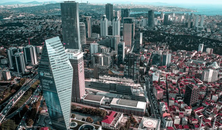 A breathtaking aerial view of Istanbul's skyline featuring skyscrapers and high-rise buildings. — Trading Tales: The Epic Jou