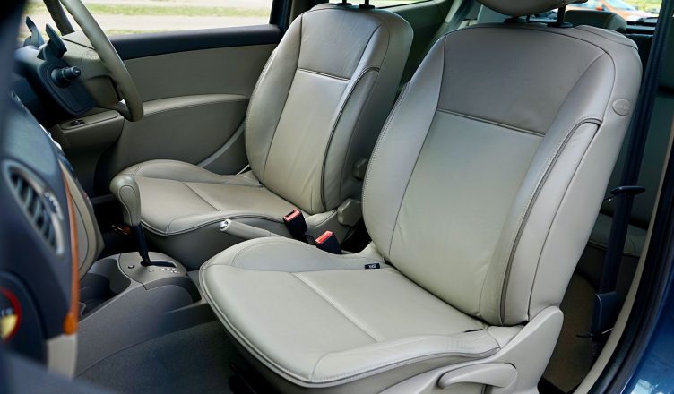 Spacious car interior featuring contemporary leather seats and a steering wheel. — USP of Quillbot that Distinguishes from ot