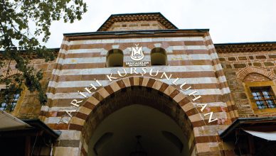 Entrance of the historic Kurşunlu Han in Manisa, Türkiye featuring traditional Ottoman architecture. — Why Women Should Consi